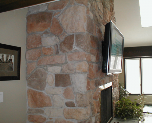 Wall TV Installation Above Brick Fireplace
